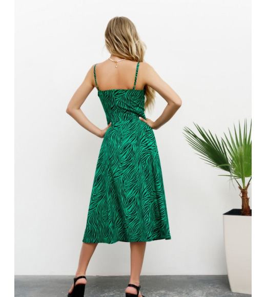 Зелена принтована сукня з розрізом