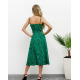 Зелена принтована сукня з розрізом