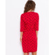 Красное трикотажное принтованное платье с карманами