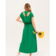 Зеленое платье с фигурным вырезом на спинке