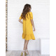 Желтое крепдешиновое платье-трапеция