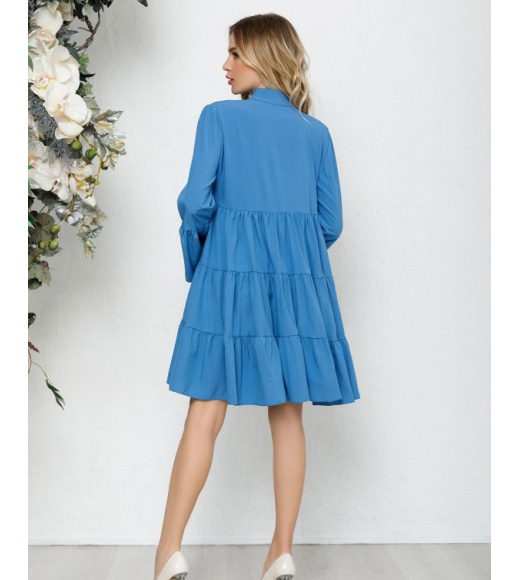 Блакитна сукня-трапеція з воланами