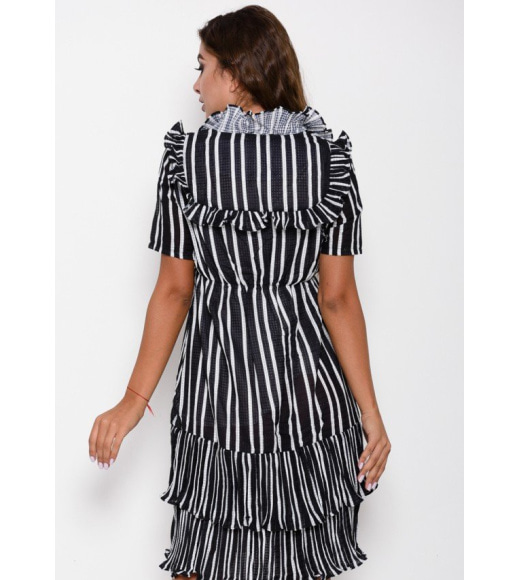 Черно-белое полосатое приталенное платье с рюшами и воланами