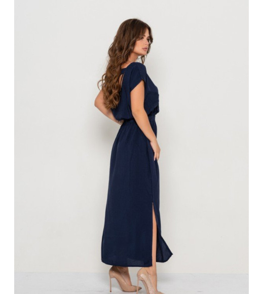 Темно-синя довга сукня з вирізом на спині