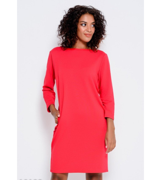 Червоне трикотажне плаття з довгими рукавами і кишенями