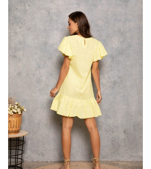 Жовта перфорована сукня-трапеція з воланами