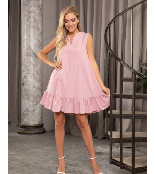 Розовое расклешенное платье с воланом
