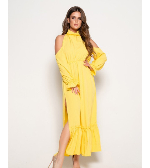 Желтое платье в пол с воланами и боковым разрезом