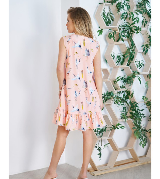 Персикова сукня-трапеція з пташиним принтом