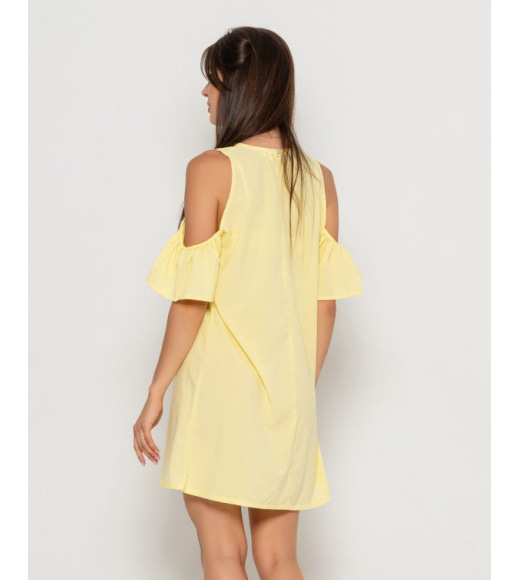 Жовте коротке плаття з вирізами на плечах