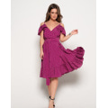Фіолетова сукня в горошок з воланами і кроєм на запах