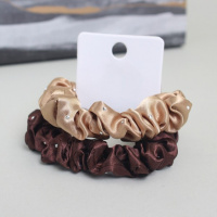 Набор из коричневой и бежевой резинок для волос
