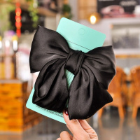 Текстильная заколка-бант черного цвета