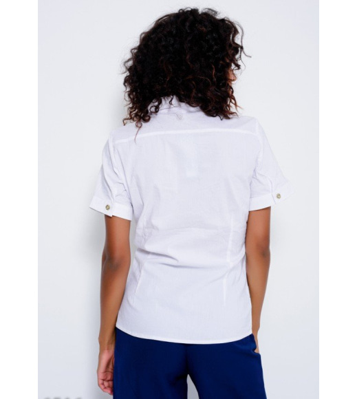 Біла котонова сорочка з короткими рукавами і кишенями на блискавках на грудях