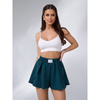 Темно-зеленые трикотажные юбка-шорты