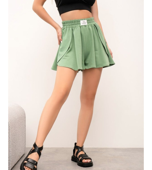 Оливковые трикотажные юбка-шорты
