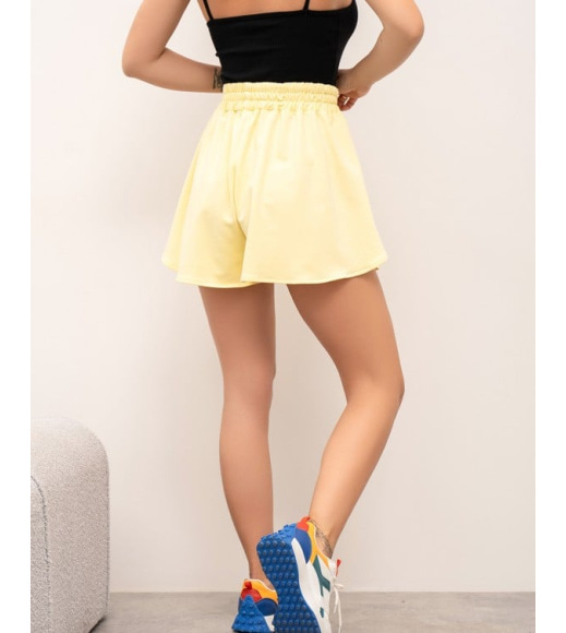 Желтые трикотажные юбка-шорты