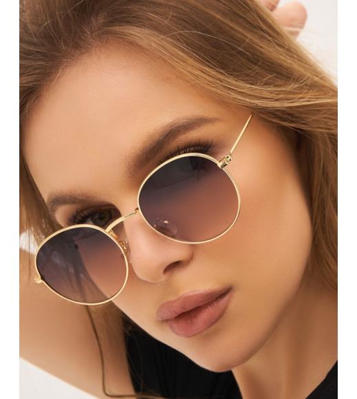 Золотистые солнцезащитные очки "панто"