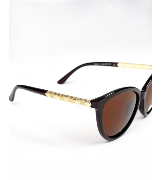 Коричневые солнцезащитные очки с золотыми вставками