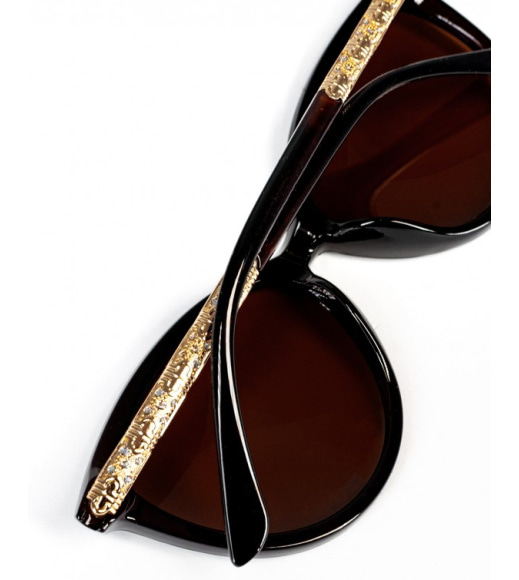 Коричневые солнцезащитные очки с золотыми вставками