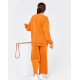 Оранжевий вільний костюм з трикотажу