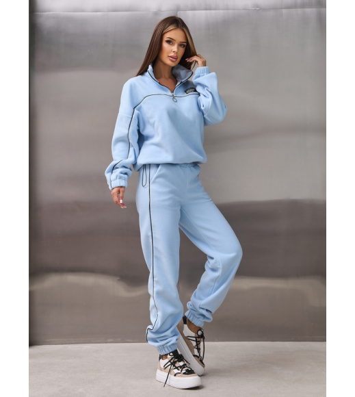 Голубой флисовый костюм с эластичными манжетами