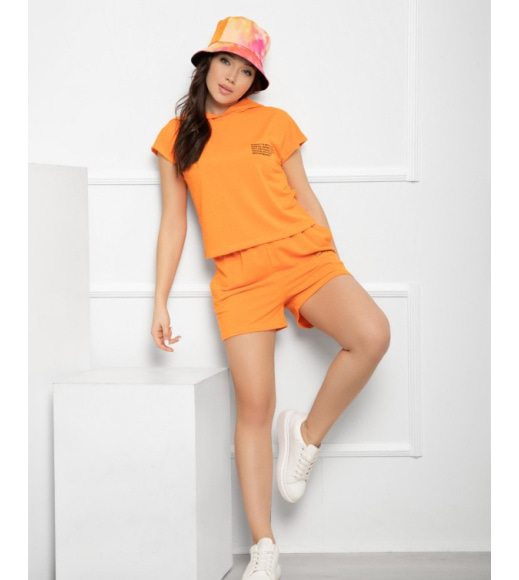 Оранжевий трикотажний костюм з капюшоном