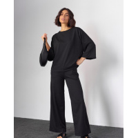 Черный трикотажный костюм свободного кроя