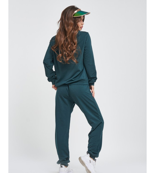 Зеленый трикотажный спортивный костюм с капюшоном