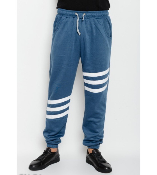 Синие спортивные штаны из трикотажа с полосками из белой тесьмы
