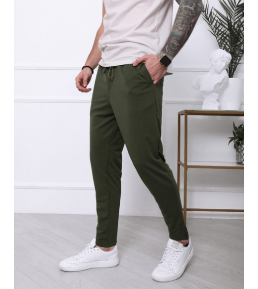 Трикотажні штани кольору хакі з накладною кишенею