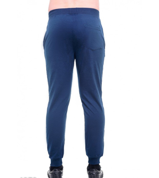 Синие мужские спортивные штаны с контрастными рисунками