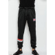 Чорні тонкі спортивні штани з трьома кишенями і принтом