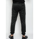 Черные тонкие спортивные штаны с тремя карманами и принтом