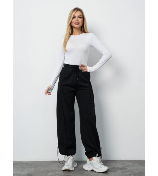 Черные утепленные брюки багги на кулисках