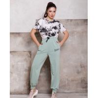 Мятные трикотажные джоггеры с принтом