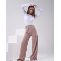 Бежевые трикотажные штаны с боковыми вставками