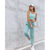 Мятные трикотажные брюки с блестящей тесьмой