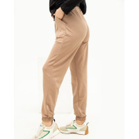 Бежеві трикотажні спортивні штани моделі Джоггер