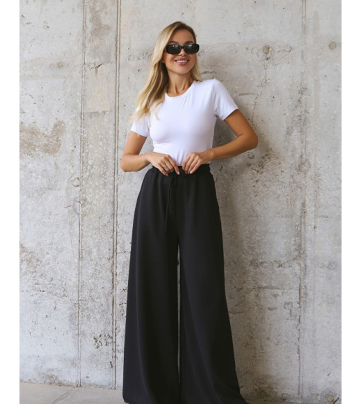 Черные широкие штаны на резинке