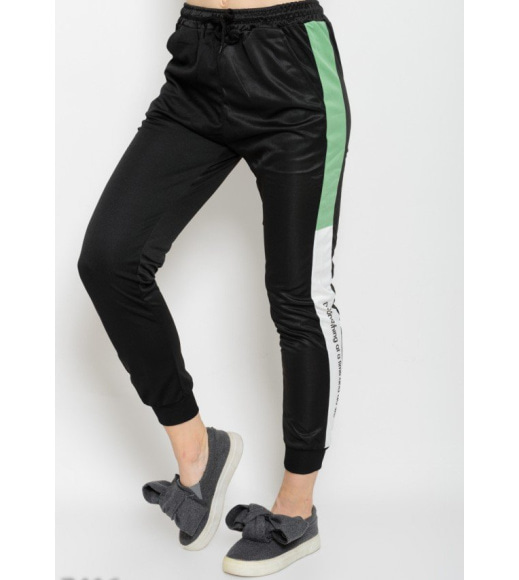 Черные спортивные штаны с бело-зелеными широкими вставками по бокам