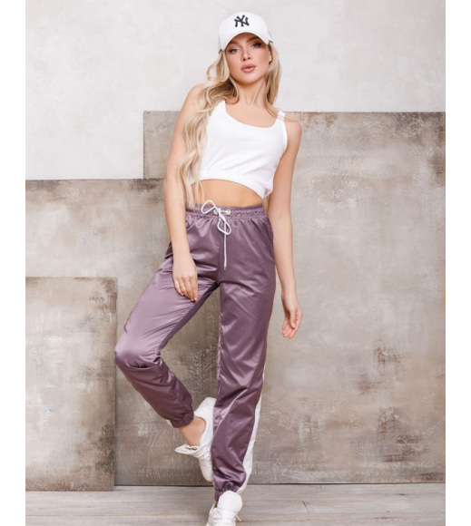 Свободные фиолетовые спортивные штаны с вставками