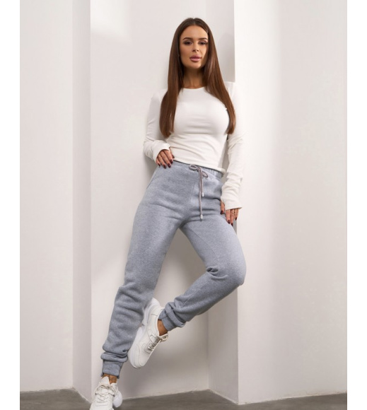 Светло-серые утепленные штаны с асимметричными манжетами