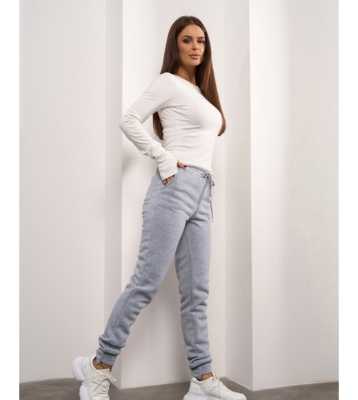 Светло-серые утепленные штаны с асимметричными манжетами