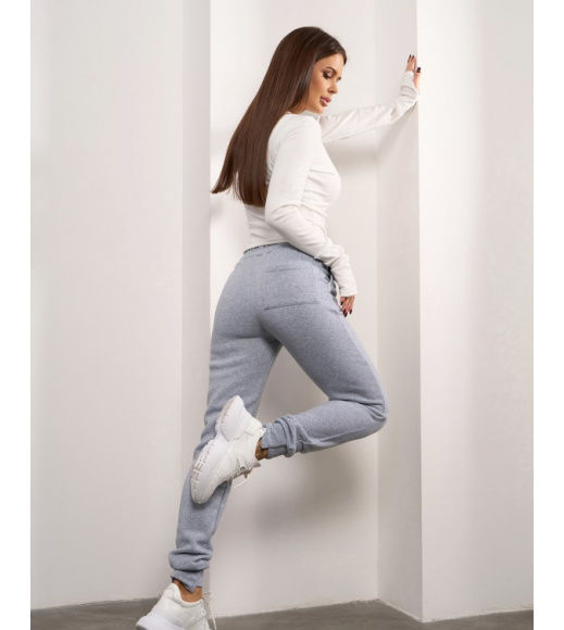 Светло-серые утепленные штаны с асимметричными манжетами