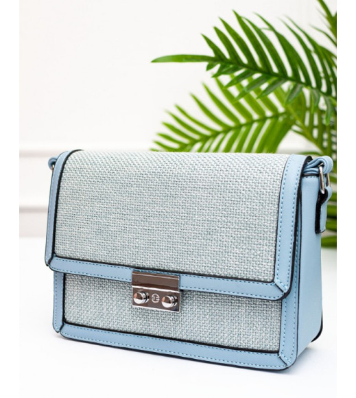 Голубая сумочка с текстильными вставками