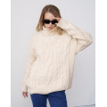Бежевий вовняний трикотажний светр з аранами