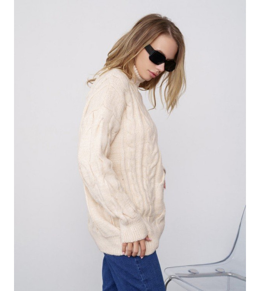 Бежевий вовняний трикотажний светр з аранами