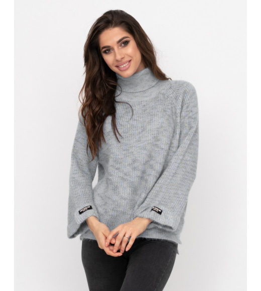 Сірий вільний в`язаний светр-травичка