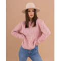 Рожевий вовняний светр з комбінованим візерунком